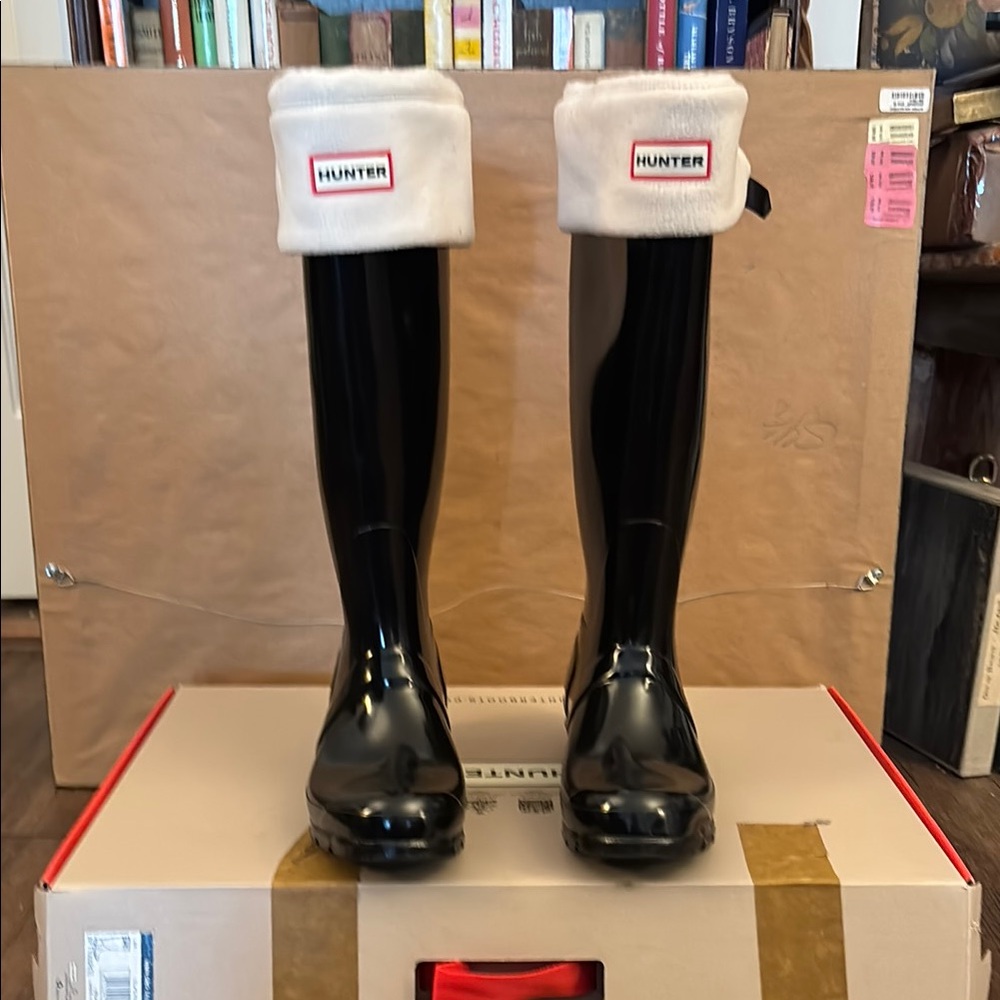 Hunter Boots with fleece socks. Size 8 US.
